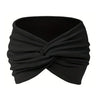 Black adjustable sports headband wrapped around the head