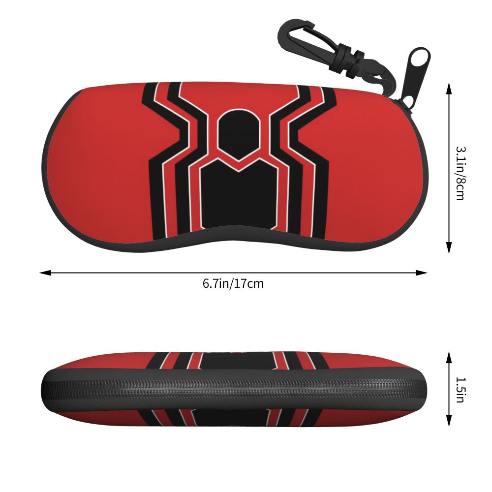 A red and black spider web patterned pouch for eyeglasses with a metal clip.