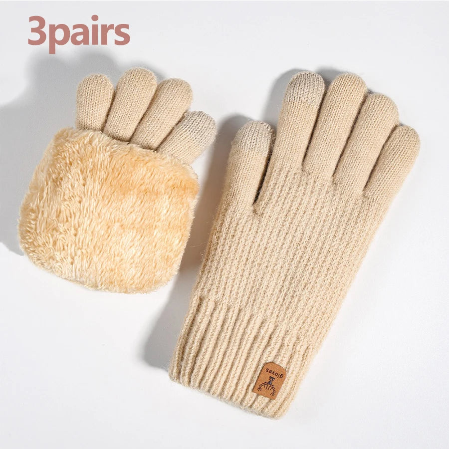 Three pairs of beige knit thermal gloves with fuzzy palms displayed on a white background.