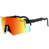 Orange-tinted cycling sunglasses with black frames and a patterned strap