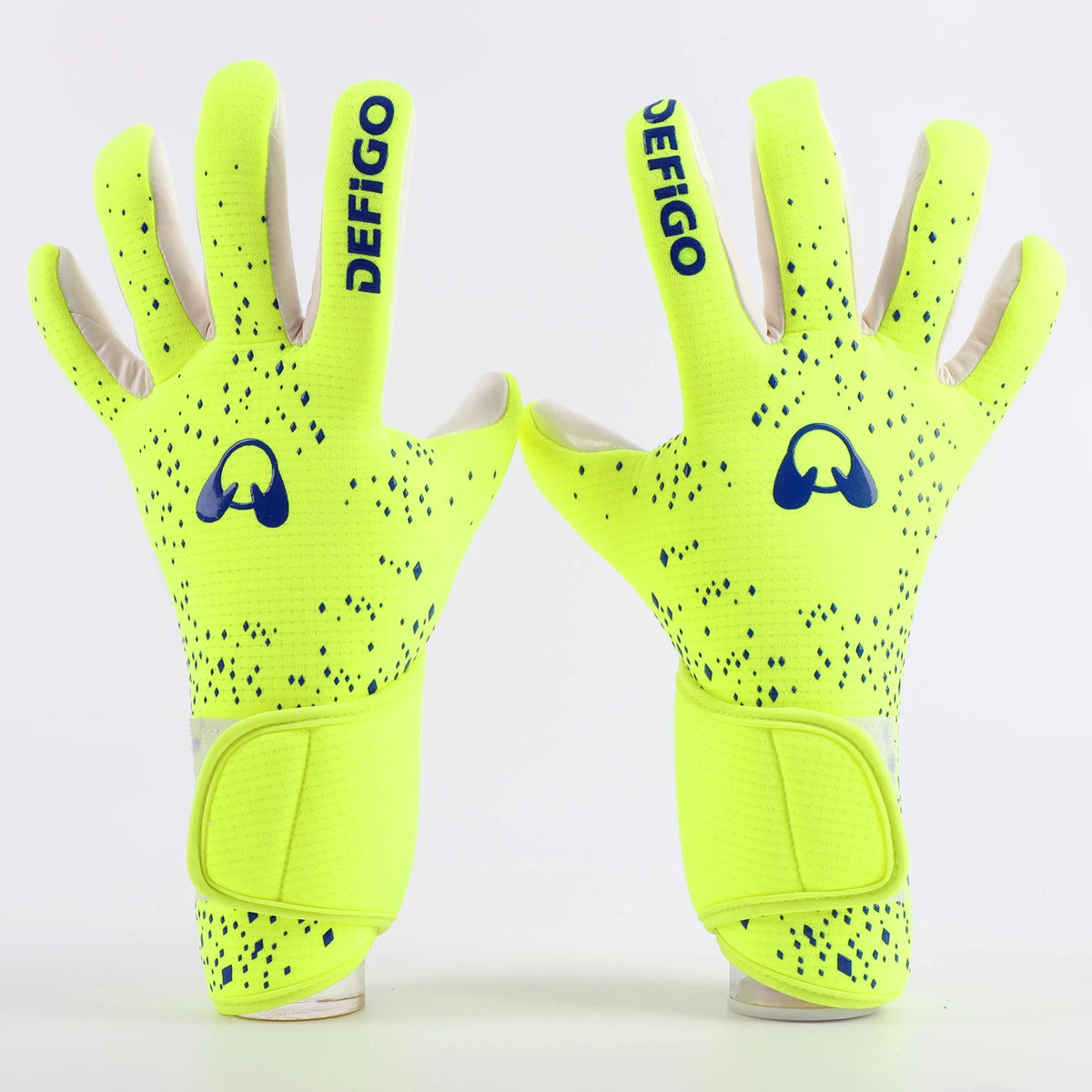 Pair of neon yellow Defigo goalkeeper gloves with black speckles