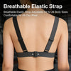 A close-up view of a black breathable elastic strap worn on the back of a person's torso.