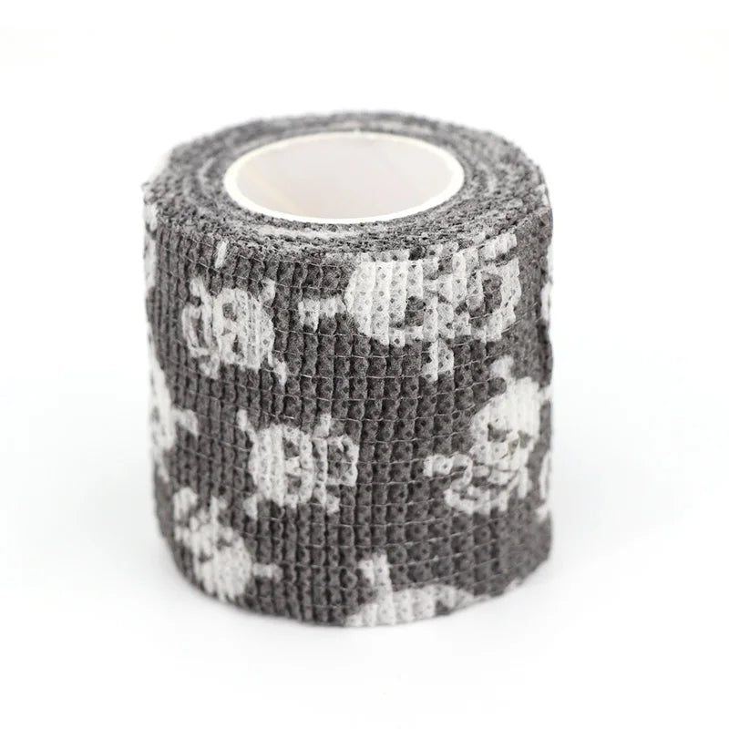 Roll of gray and white fruit pattern elastic bandage tape for joints