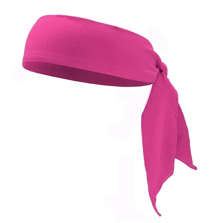 A bright pink breathable sports headband tied in a knot.