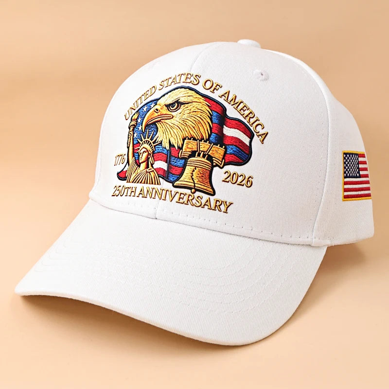 A white adjustable cotton baseball cap featuring a graphic of an American bald eagle and text celebrating the United States o