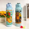 A light blue insulated sports water bottle featuring a green monkey design and the text IMPANZINANNN.