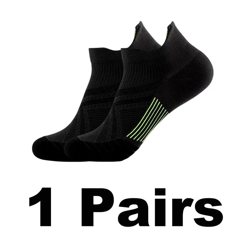 A pair of black performance compression sports socks shown from the side.