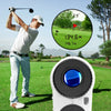 A man is using a professional laser rangefinder device to measure a golf shot on a green field.