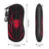 A black and red spider web patterned eyeglass pouch with a zipper closure.