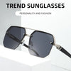 A pair of black aviator sunglasses with double bridge and UV400 protection displayed on a white surface.