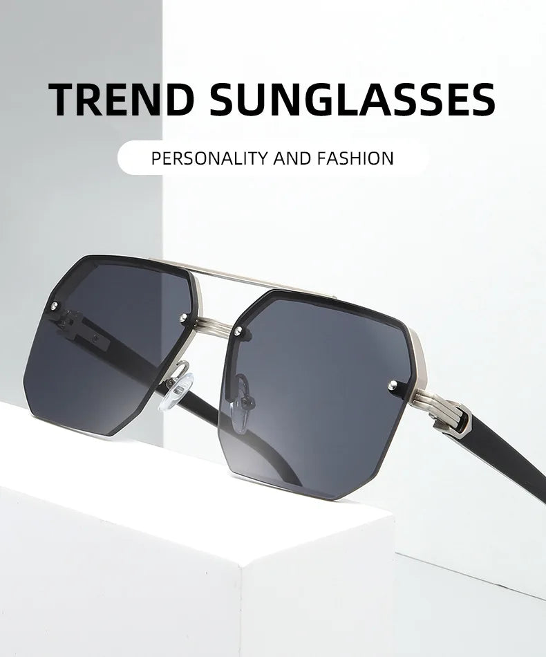 A pair of black aviator sunglasses with double bridge and UV400 protection displayed on a white surface.