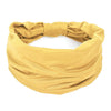 A mustard yellow non-slip elastic headband for fitness or hair