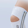 White elastic knee support brace with four thick springs visible on the side.