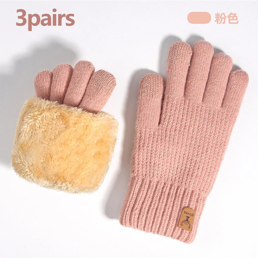Three pairs of pink knit gloves with fluffy beige cuffs shown against a white background.