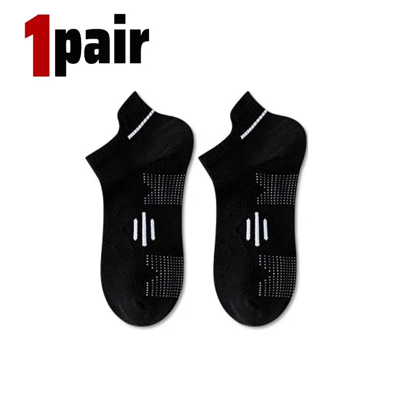 A pair of black premium breathable men's running socks shown flat.