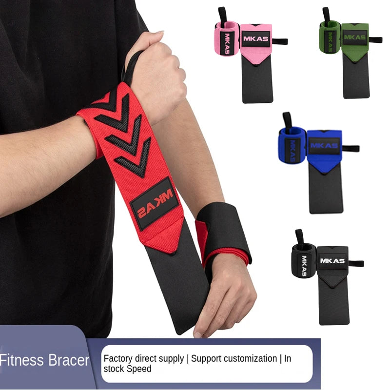 A hand is wearing a red fitness brace on the forearm, next to various colored wrist supports.