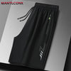 Black men's quick dry jogging shorts displayed flat on a gray surface.