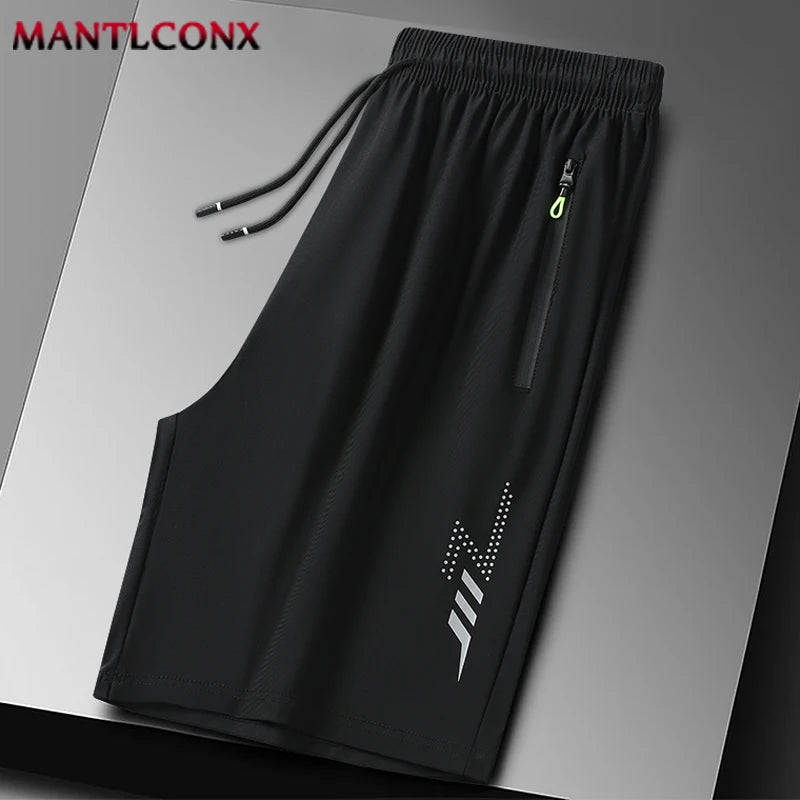 Black men's quick dry jogging shorts displayed flat on a gray surface.
