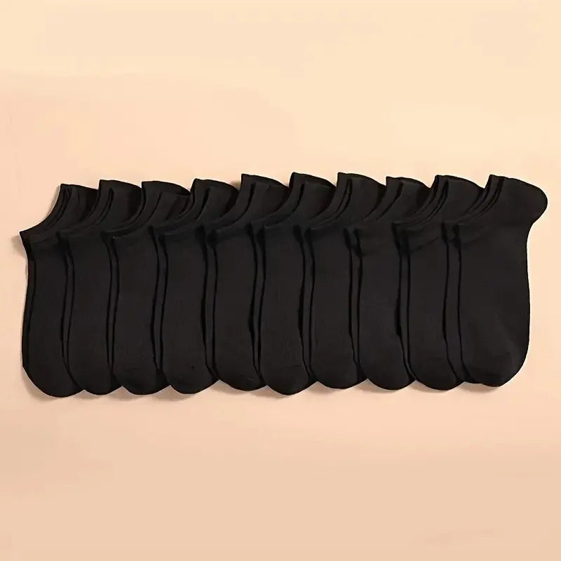 A row of black breathable unisex boat socks laid out flat against a light background.