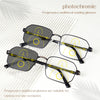 Pair of photochromic progressive multifocal reading glasses shown on a white background.
