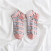 Pair of pink and gray striped socks with 'love' and 'oops' lettering for summer fashion