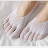 A pair of light pink, ultra-thin invisible boat socks are shown on a person's foot against a white background.
