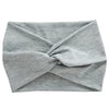 Gray women's elastic sports headband folded and tied