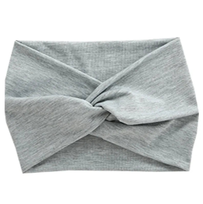 Gray women's elastic sports headband folded and tied