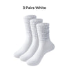 Three pairs of white women's slouch knit scrunch socks displayed together.