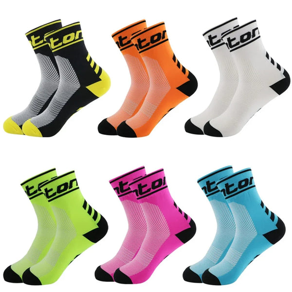 A collection of performance cycling and running socks in various colors including black, yellow, orange, pink, and light blue
