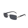 Gafas sin montura de diamantes negros con detalle de cadena dorada