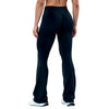 A person wearing dark blue seamless flared yoga leggings standing, viewed from the front.