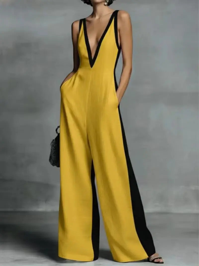 Un mannequin porte une combinaison à encolure en V bicolore jaune et noir avec poches.