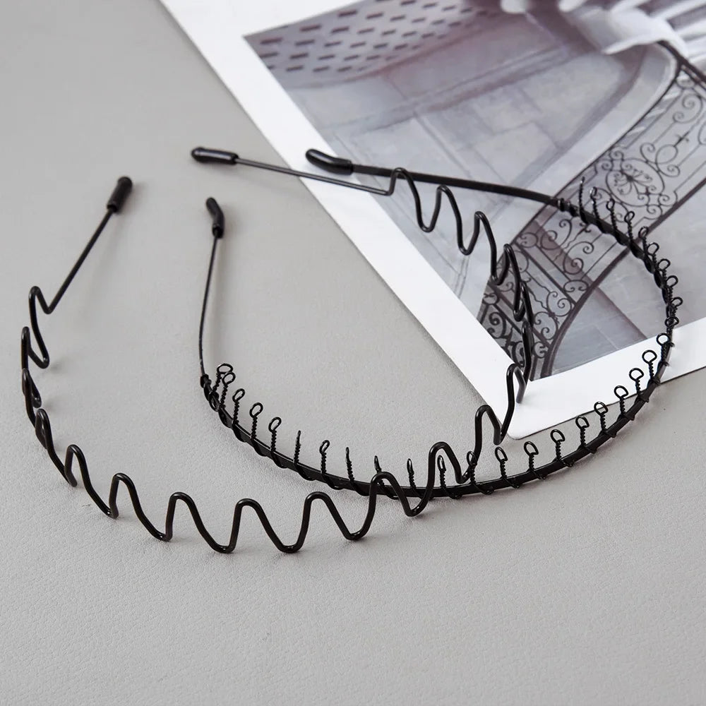 Black fashion metal hair bands with flexible wire designs displayed on a white background.