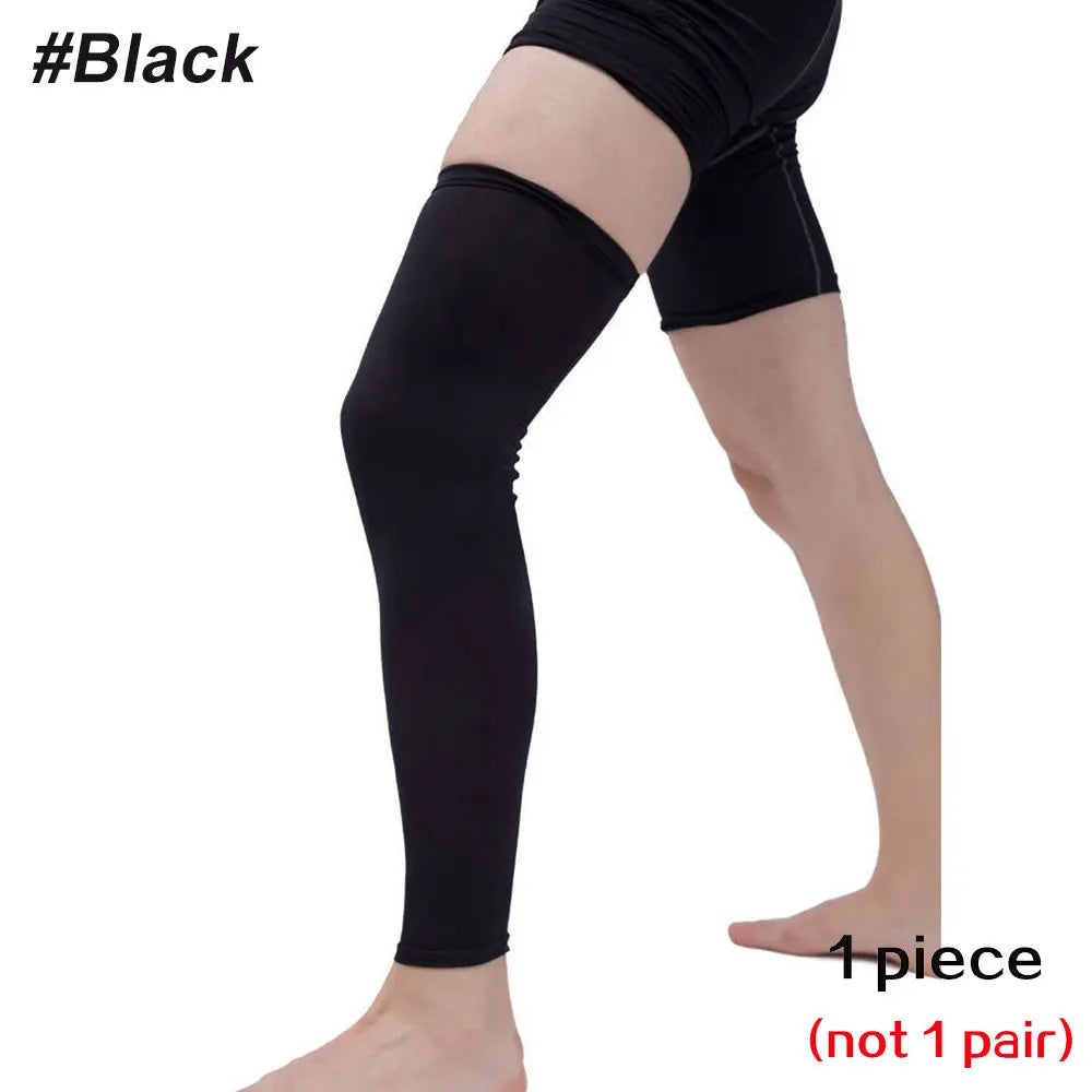 Black full leg compression sleeve worn on a person's leg.