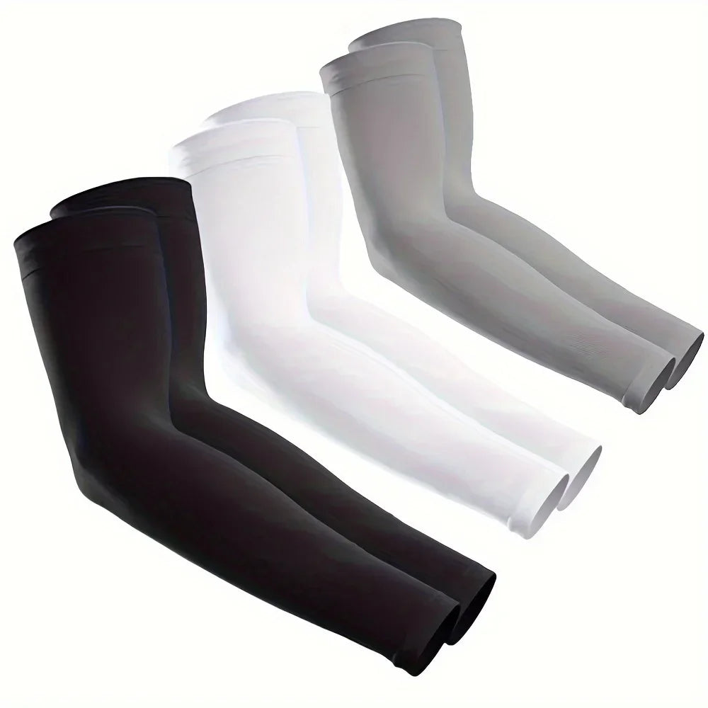 A set of four arm sleeves in black and white, showing different shades for UV protection.