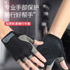 A close-up of a hand wearing a black and gray breathable glove for sports activity.