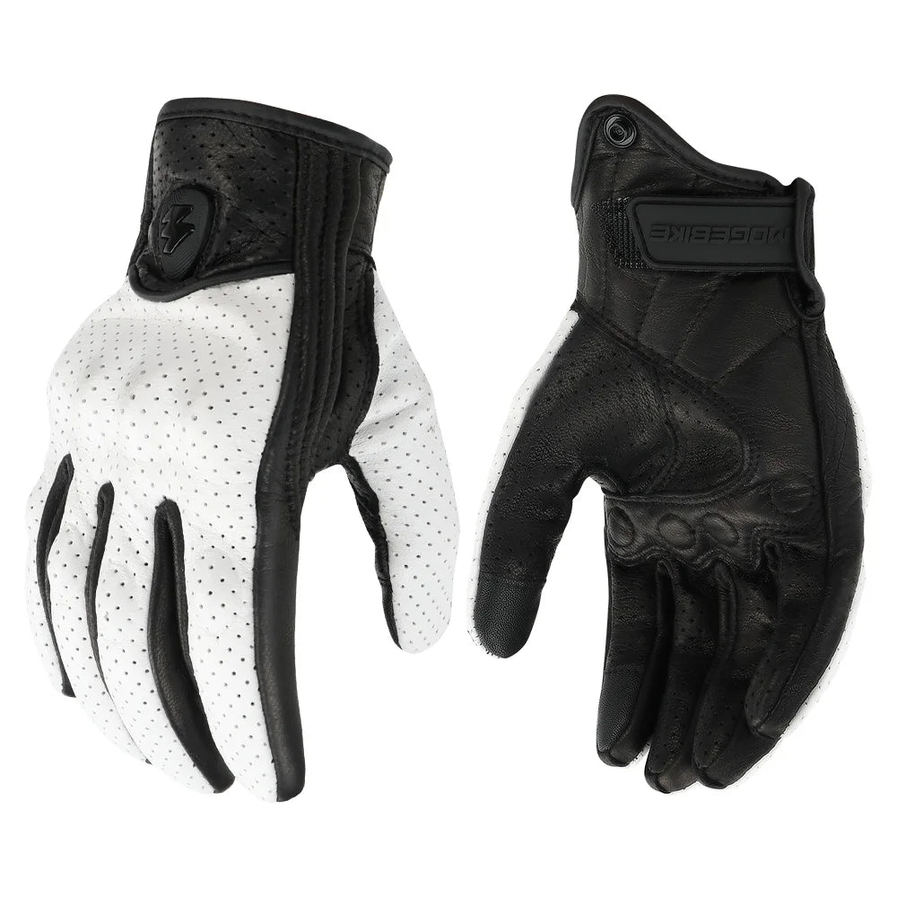 A pair of black leather motorcycle riding gloves with white dotted palms and wrist protection.