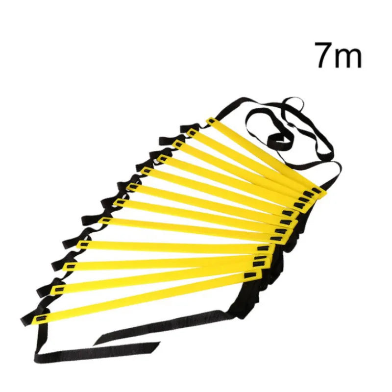 A yellow and black agility ladder stretched out, showing the structure for sports training.