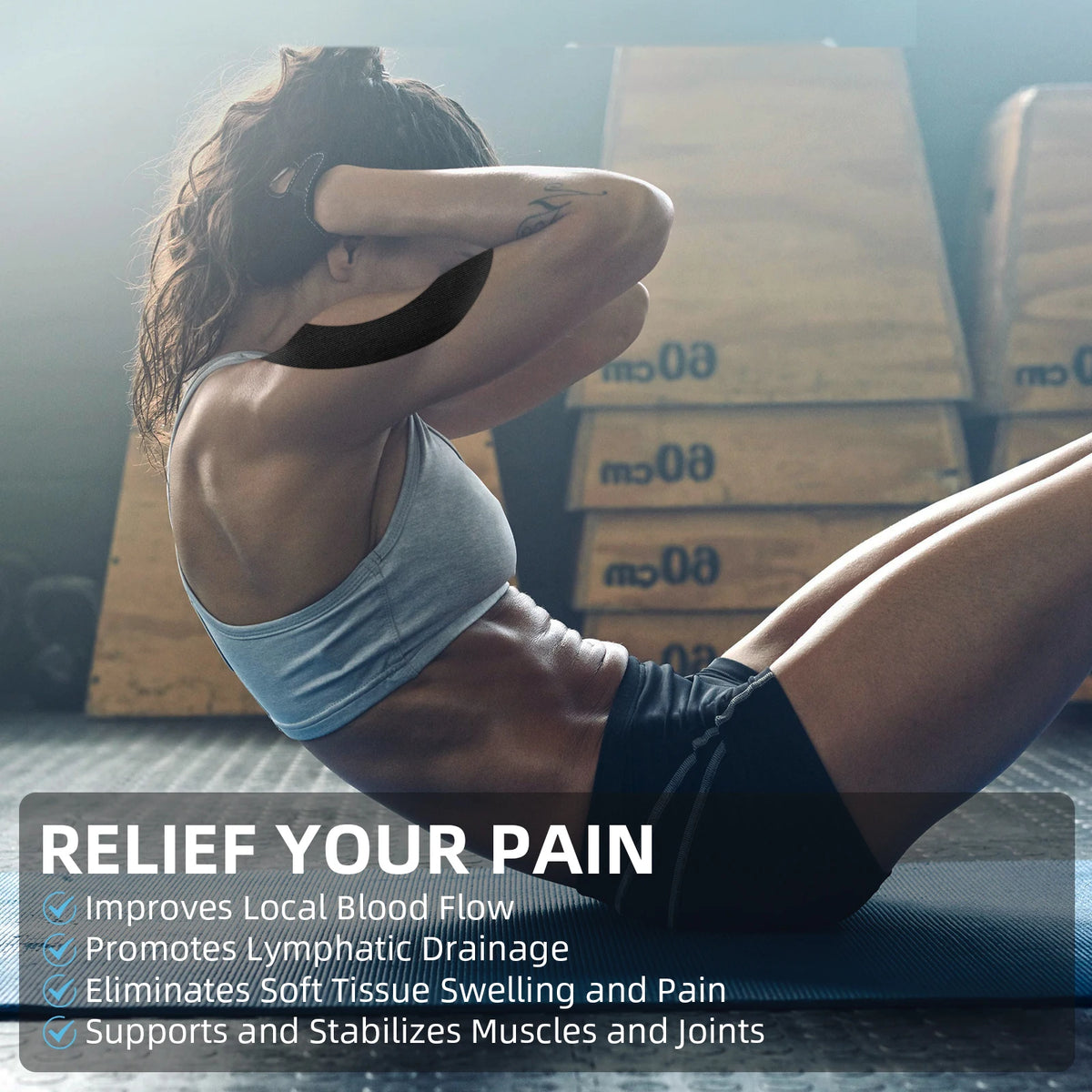 A woman stretches her leg while applying kinesiology tape to her muscle and joint for pain relief.