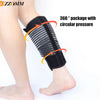 Black adjustable calf compression brace wrapped around a person's lower leg for pain relief