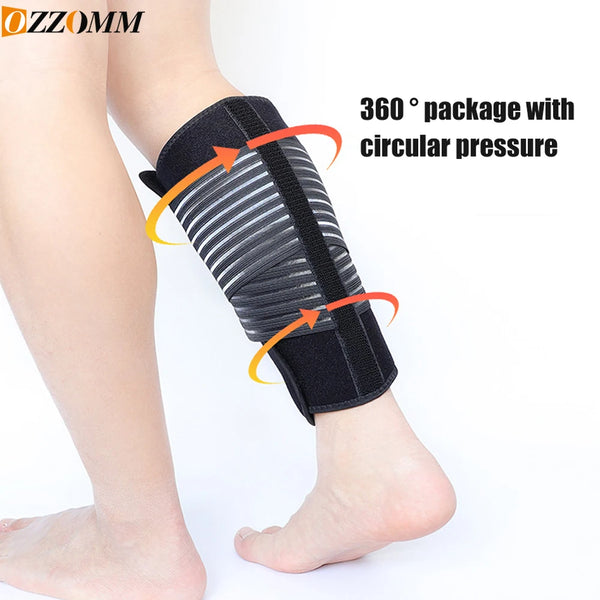 Black adjustable calf compression brace wrapped around a person's lower leg for pain relief