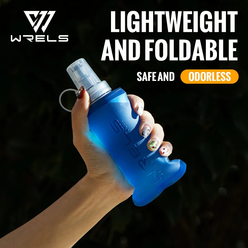 A hand holds a lightweight and foldable blue silicone water flask for outdoor activities.