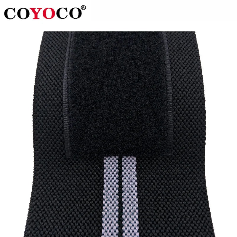 Black heavy duty wrist wraps with light gray stripes shown in a close-up view
