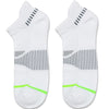 A pair of white crew socks for men with black and neon green stripes.
