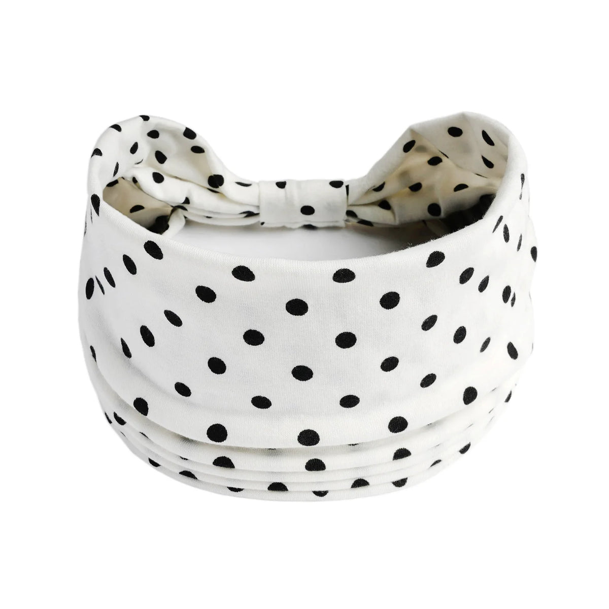 Weißes Baumwoll-Yoga-Headband mit schwarzen Polkadotten, zu einer Schleife gebunden
