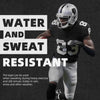 A muscular athlete wearing a black jersey and helmet demonstrates the water and sweat resistant tape.