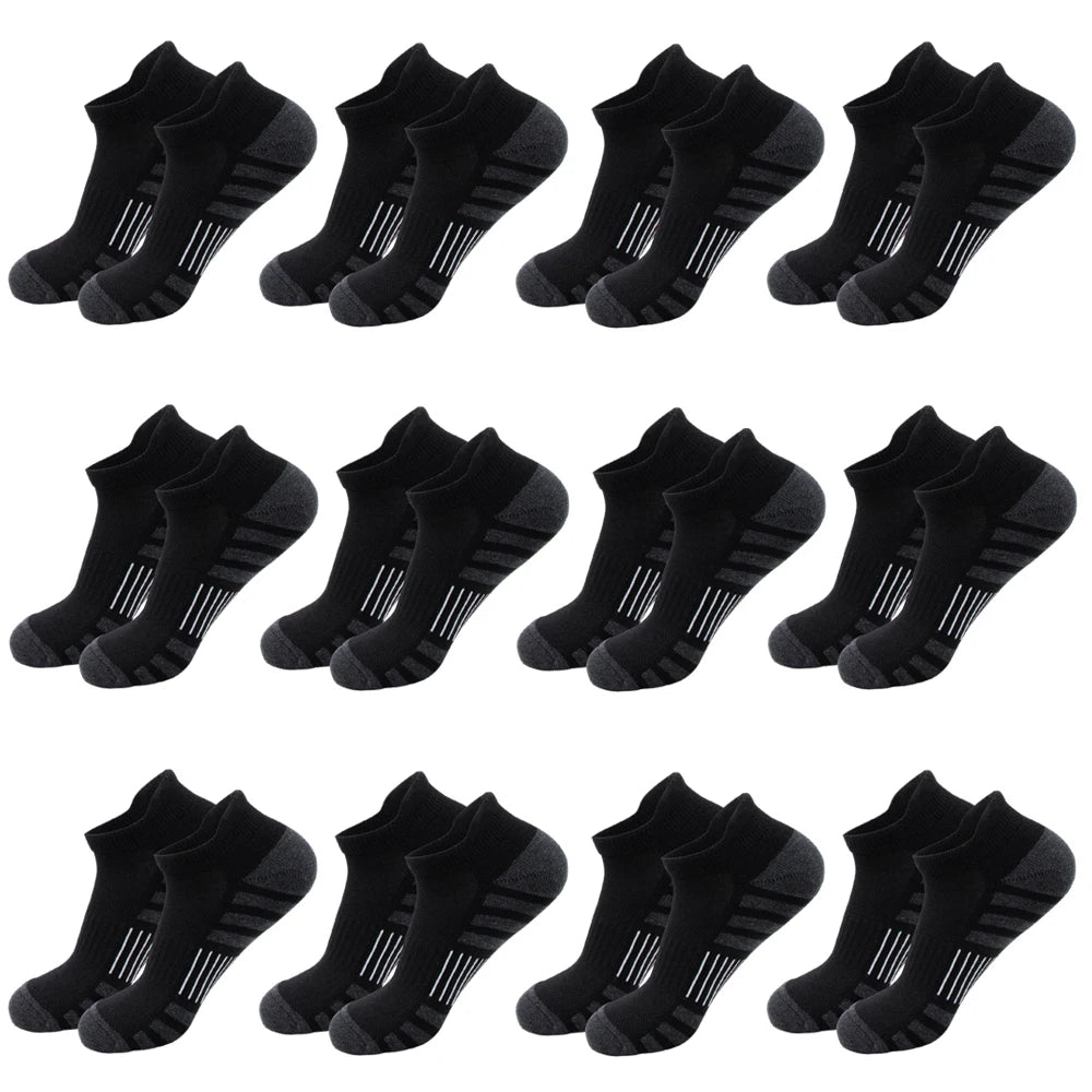 A set of black athletic running socks for men and women displayed in various angles.