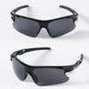 Black sport sunglasses with black frames and dark lenses shown against a white background.