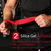 A person wearing a black shirt is holding a red silicone gel antiskid wrist strap for grip and support.